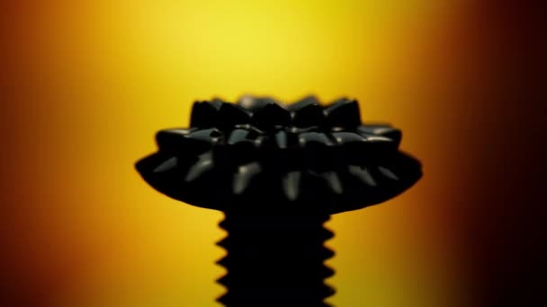Чорна Феромагнітна Рідина Жовтому Градієнтному Фоні Обертається Зліва Присутності Магнітного — стокове відео