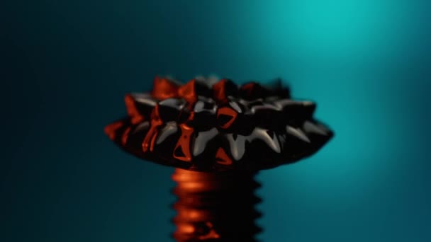 Hitam Dan Oranye Ferrofluid Pada Latar Belakang Gradien Biru Tumpah — Stok Video