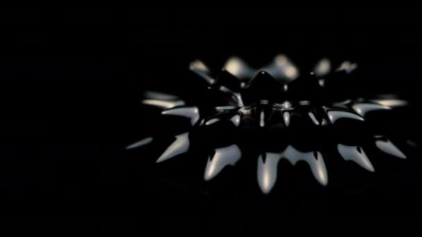 Close Shot Black Ferromagnetic Fluid Spinning Left Dark Background — Stock Video