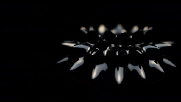 Close Shot Black Ferrofluid Spinning Left Dark Background — Stock Video