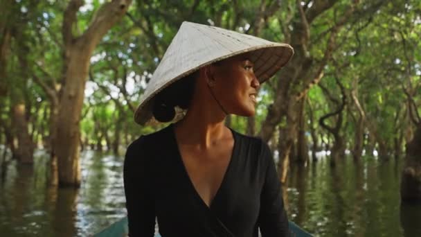 Woman Riding Boat Surrounded Lush Mangroves Embracing Beauty Coastal Landscape — Stock Video