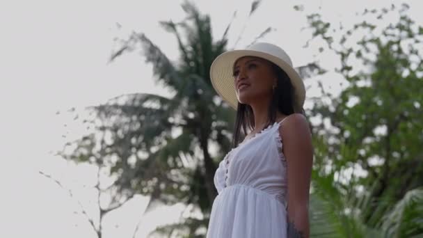 Envisioned Low Angle Perspective Woman White Dress Sunhat Smiles While — Stock Video