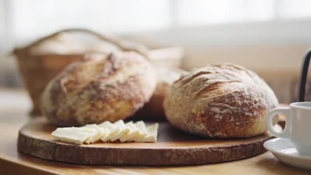 Zoom Out Shot Breakfast Table Featuring Loaves Bread Slice Butter — Stock Video