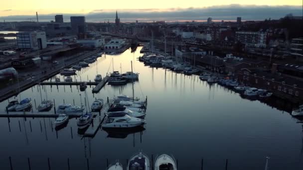 Drone View Marina Boats Yachts Showcasing Buildings Cityscape Sunset — Stock Video
