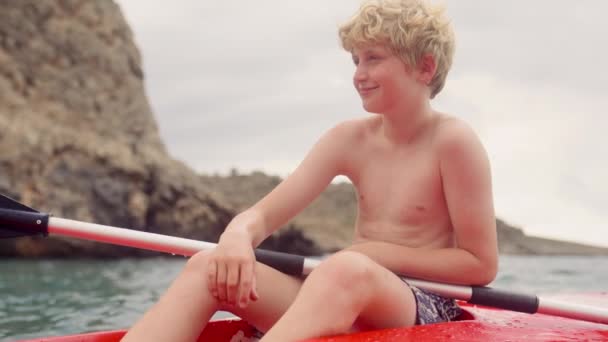 Smiling Young Boy Bright Red Kayak Crete Waters — Stock Video