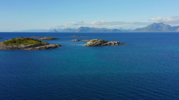 Drone Shot Panning Blue Seas Lofoten Islands Showing Hazy Mountains — Stock Video