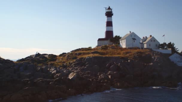 Ferry Voyage Gracefully Passing Coastal Homes Skrova Lighthouse Perched Secluded — Stock Video