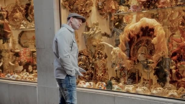 Tourist Wearing Jacket Hat Admires Intricate Ornate Golden Artworks Display — Stock Video