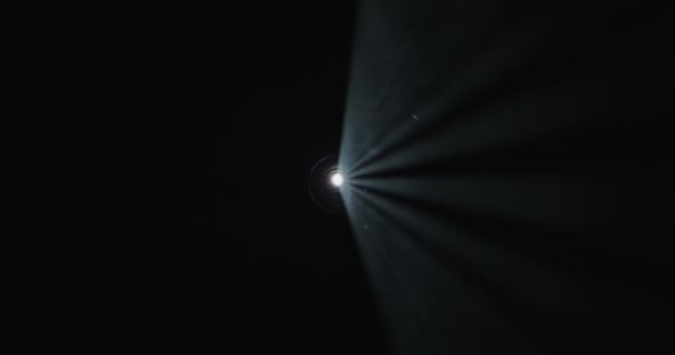 Index Finger Seamlessly Slides Luminous White Light Rays Surrounded Darkness — Stock Video
