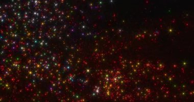 Evrenin ışıl ışıl güzelliği, göksel renklerin ortasında galaktik tuvali boyayan parıldayan yıldızları vurguluyor.