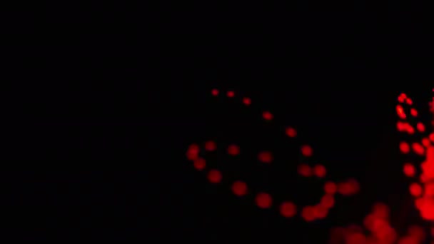 Oświetlone Czerwone Kropki Światła Poruszające Się Przez Ciemność — Wideo stockowe