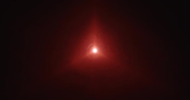 Triangular Shaped Red Smoke Piercing Darkness Intertwining Dazzling Lens Flare — Stock Video