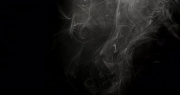 Close Wisps Smoke Moving Air Black Background Illuminated Bright Light — Stock Video