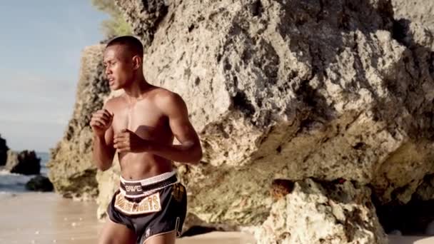 Muay Thai Fighter Practicing Powerful Combo Dynamics Coastal Rocks Slow — Stock Video