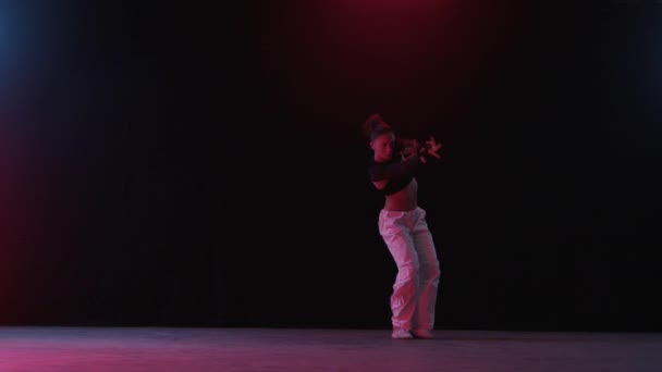 Woman Dances Captivating Expression Her Movements Unfolding Gracefully Amidst Ambient — Stock Video