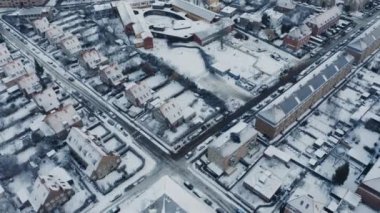 Beyaz karda Kopenhag 'ın ikonik simgelerini ve resimli caddelerini yakalayan çarpıcı bir hava görüntüsü kış merakı manzarası yarattı.