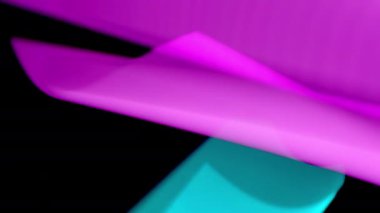 Canlı neon, pembe ve cyan ışıklar renk ve hareketin dinamik bir göstergesi olarak ekranda hızla dans ediyor.