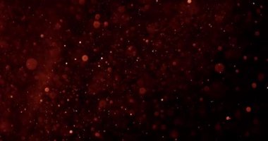 Parıldayan bokeh kum tanecikleri yavaşça sürükleniyor, dingin ve büyüleyici bir görsel ekran yaratıyor