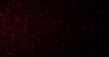 Işıldayan kumlar zarif bir şekilde büyüleyici bokeh dairelerine dönüşerek büyüleyici bir görsel ışık ve doku gösterisi yaratırlar.