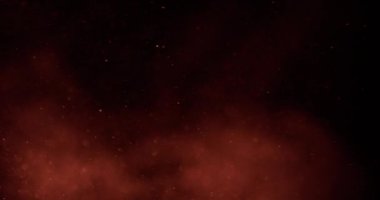 Sakinleştiren kum parçacıklarının sakin ve büyüleyici bir görsel efekt yaratarak siyah bir arkaplana doğru zarif bir şekilde akması.