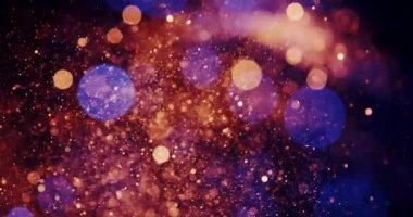 Karanlık bir zemin üzerinde bokeh etkisi olan bir sürü dairesel parçacık. Genel tonu koyu, sağ tarafında koyu maviler ve morlar ve solunda sıcak kırmızı ve portakallar var..