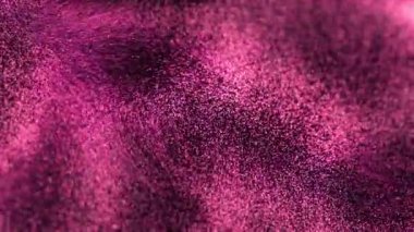 Pembe tonlarda sayısız küçük, ışıl ışıl parçacıklar büyüleyici bir görsel etki yaratır. Parçacıklar yoğun bir şekilde kümelenmiş ve merkezde parlaklıkları yoğunlaşmıştır.