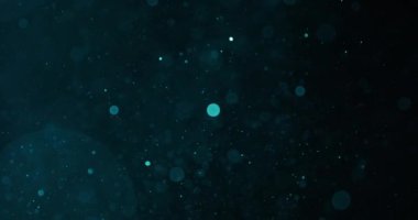Parlayan mavi bokeh parçacıklarının kusursuz akışı siyah bir arkaplan üzerinde zarafetle sürükleniyor.