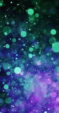 Yeşil ve menekşe parçacıkları uyum içinde yüzerek uyumlu ve akışkan bir hareket oluştururlar.