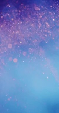 Yumuşak mavi ve turuncu bokeh kıvrılarak sakin ve rüya gibi bir atmosfer yaratıyor.