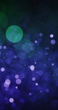 Dinamik bokeh bulanıklığı, hareketli mavi ve yeşil parçacıkların büyüleyici akışına sorunsuzca dönüşür