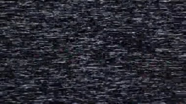 Sabit ses ve ekran bozulmasını gösteren klasik bir VHS kaset oynatıcısı. Nostaljik retro video oynatıcısını karıncalı doku ve titreşimli arızalarla yakalıyor.