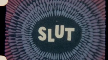 End title Slut displayed with intricate hand-painted patterns in a vintage 8mm film style, offering a unique artistic touch on a classic retro backdrop