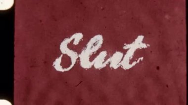 A vintage 8mm-style film featuring the word Slut in cursive, displayed on a red backdrop with a liquid distortion effect, creating a retro, distorted aesthetic
