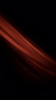 Parlayan turuncu ateş şeritleri akıcı bir şekilde karanlık arka plan boyunca hareket ederek dramatik ve yoğun bir görsel etki yaratır.