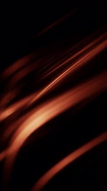 Kehribarın her izi yoğun sıcaklıkta kehribar saçan koyu siyah bir zemin üzerinde parlak ateş şeritleri, pürüzsüz dönen hareketlerle karanlığı çiziyor.