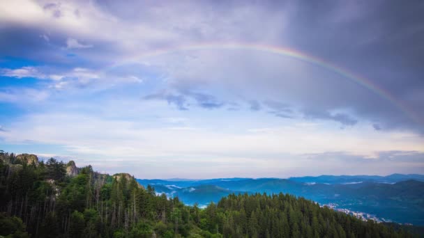 Thin Multi Colored Almost Transparent Rainbow Flaunts Top Mountain Range — Stock video