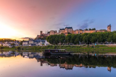 Chinon is located in the heart of the Val de Loire, France. Well known for its wines as well as its castle the Chateau de Chinon and historic town. Chinon played an important and strategic role 