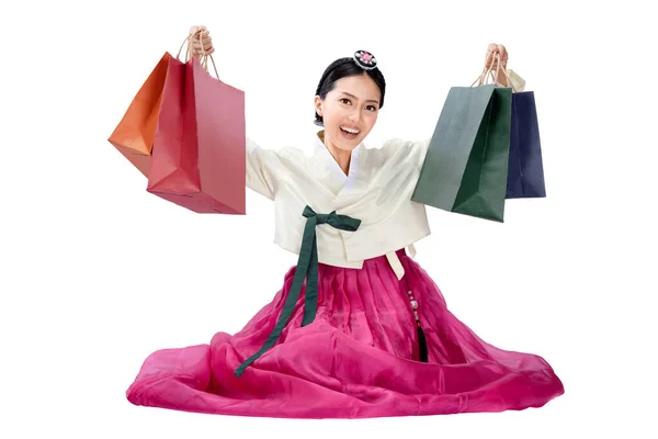 Azjatka Tradycyjnym Koreańskim Stroju Narodowym Hanbok Siedzi Trzyma Torby Zakupy — Zdjęcie stockowe
