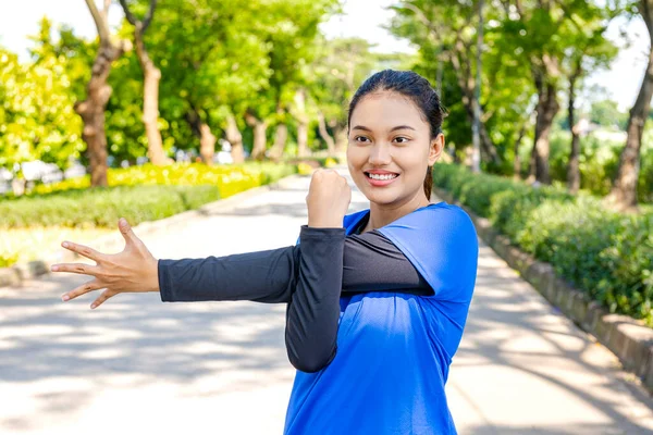 Asian Woman Stretching Her Arms Running Park — Stock Photo, Image