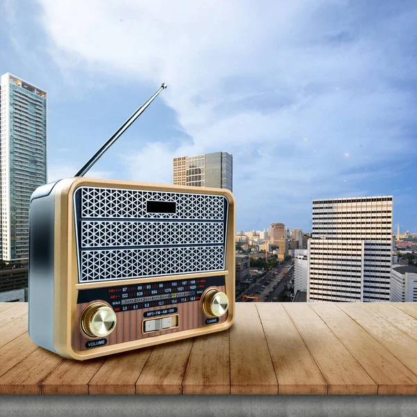Old radio on a cityscape background. World Radio Day