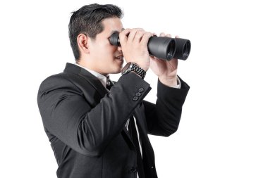 Asian businessman looking through binoculars isolated over white background