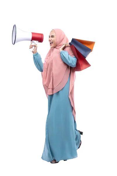 Asian Muslim Woman Veil Holding Megaphone Shopping Bags Isolated White — Stockfoto