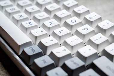 The mechanical keyboard on textured background