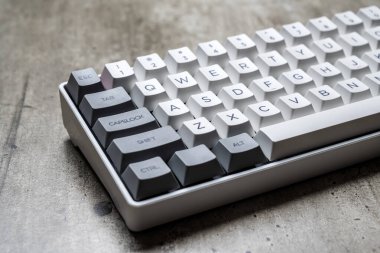 The mechanical keyboard on textured background