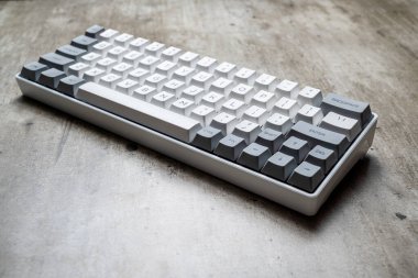 The mechanical keyboard on textured background