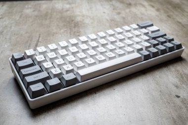 The mechanical keyboard on textured background