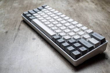 The mechanical keyboard on textured background