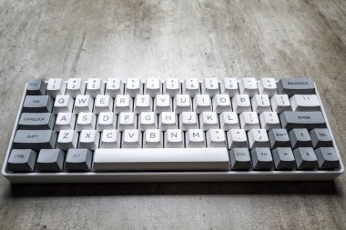 The mechanical keyboard on textured background