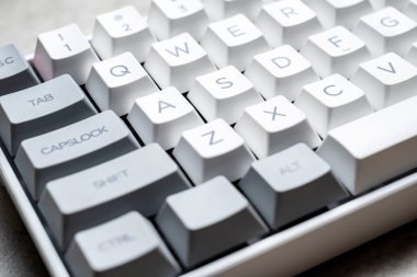 The mechanical keyboard on textured background