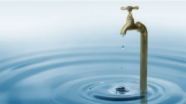 Water faucet with water drop. World Water Day Concept